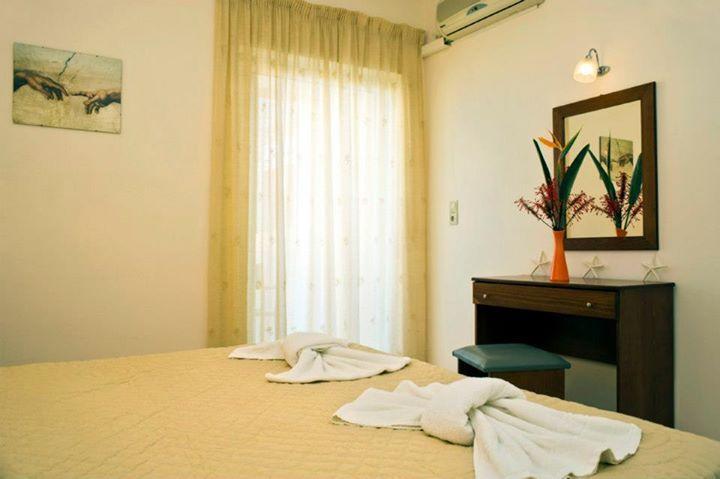 Alfa Hotel Apartments Jeráni Haníon Szoba fotó